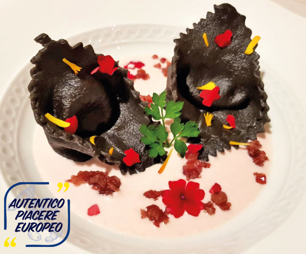 Tortello alla birra e aringa affumicata, con salsa rosa alla mortadella e Cotechino Modena IGP croccante all’anice stellato